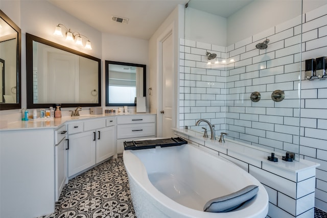 bathroom with plus walk in shower, tile walls, and vanity