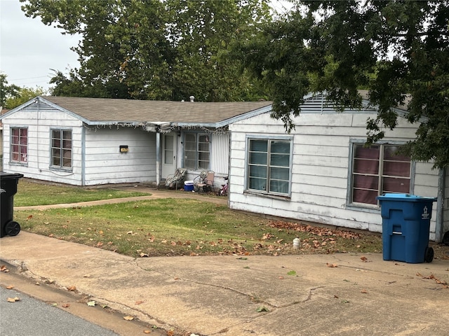 exterior space with a front yard