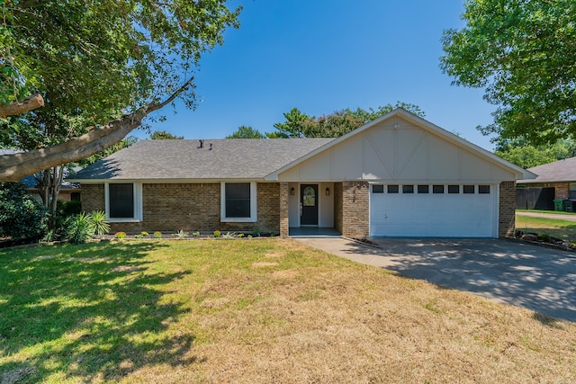 single story home with a garage and a front lawn