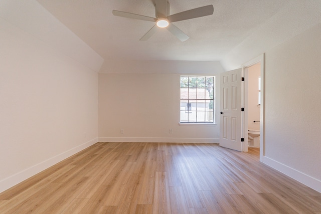 unfurnished room featuring a textured ceiling, ceiling fan, and light hardwood / wood-style floors