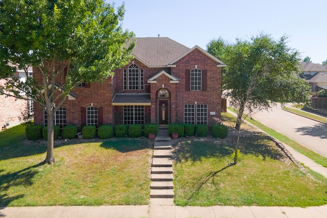 view of front facade with a front yard