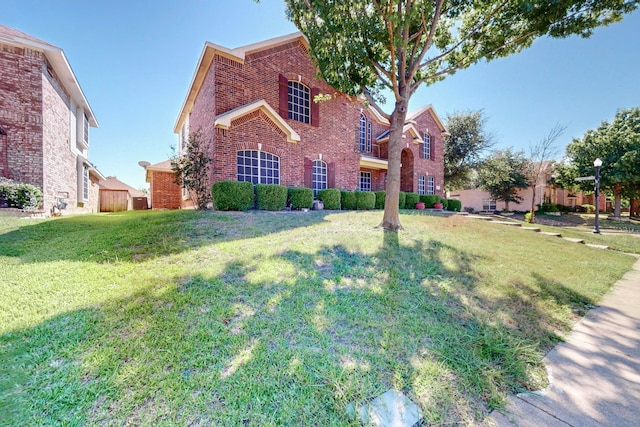 view of front of house featuring a front lawn