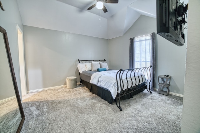 bedroom featuring ceiling fan, carpet, and lofted ceiling