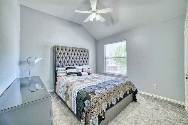 bedroom with ceiling fan, light colored carpet, and vaulted ceiling