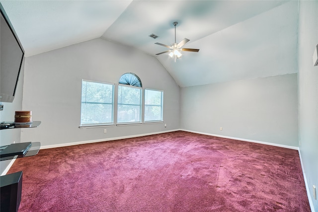 unfurnished living room featuring carpet, vaulted ceiling, and ceiling fan