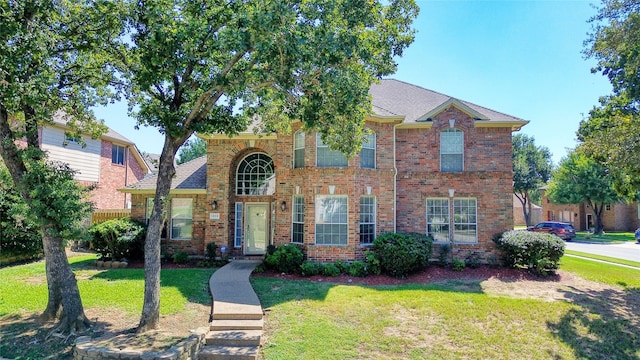 view of front of property with a front lawn