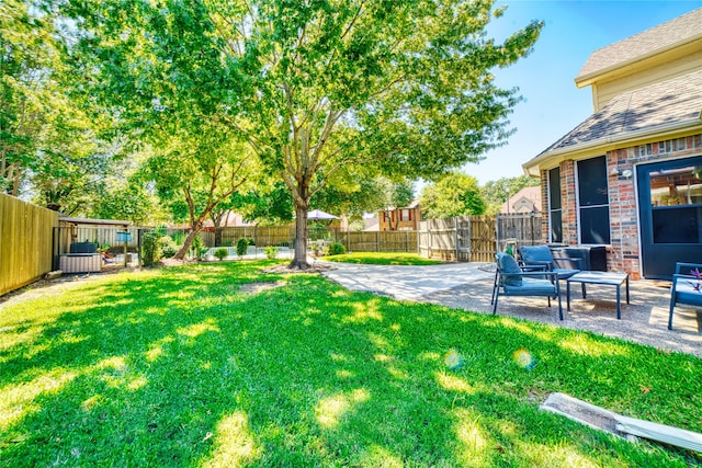 view of yard with a patio area