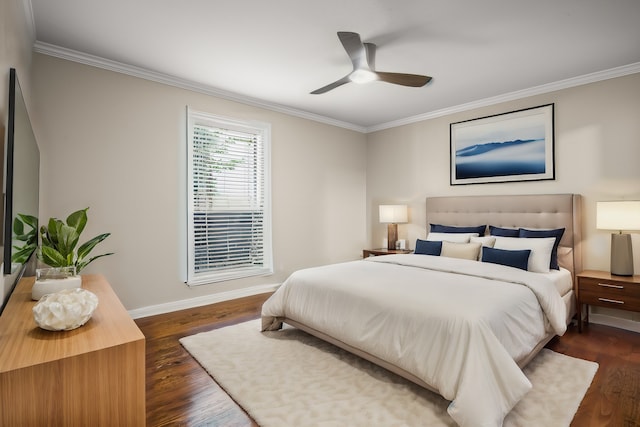 bedroom with dark hardwood / wood-style floors, ceiling fan, and crown molding