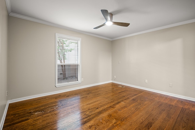 unfurnished room with dark hardwood / wood-style flooring, ceiling fan, and ornamental molding