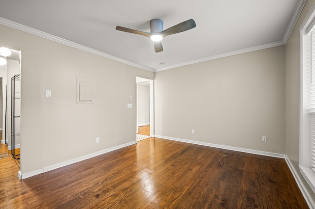 spare room with hardwood / wood-style flooring, ceiling fan, and ornamental molding