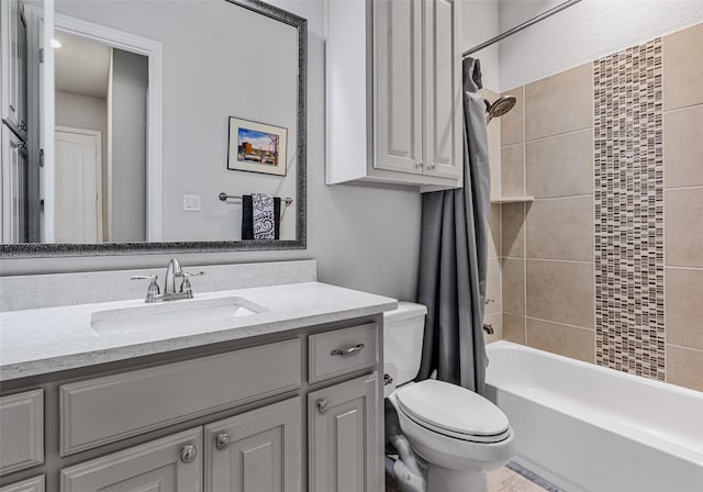 full bathroom with vanity, shower / bathtub combination with curtain, and toilet