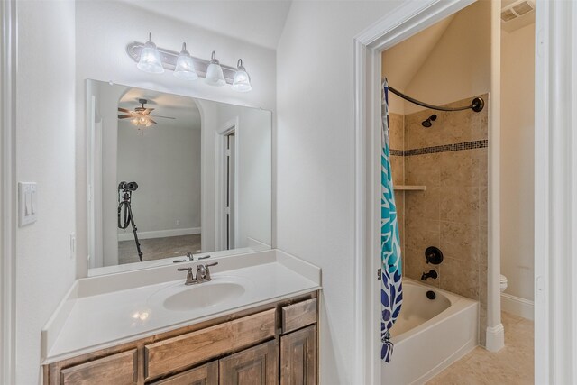 full bathroom with toilet, vanity, ceiling fan, vaulted ceiling, and shower / tub combo with curtain