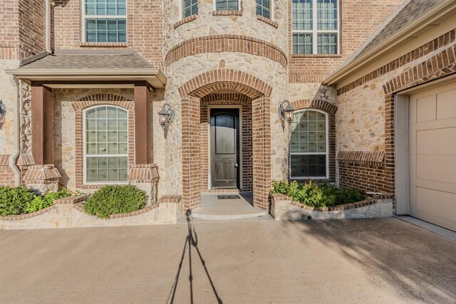 property entrance featuring a garage