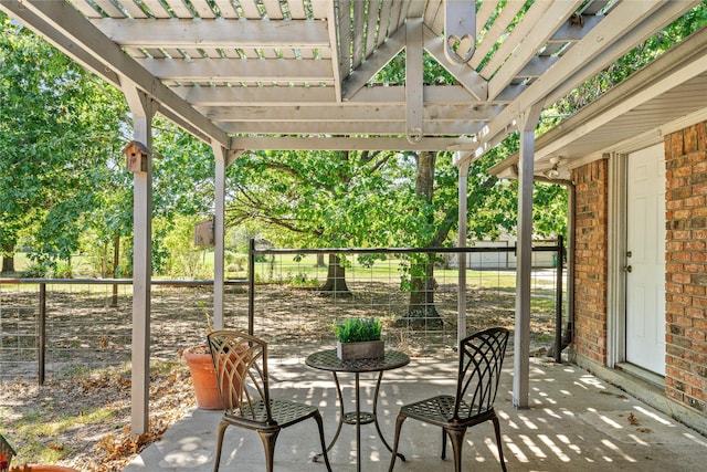 view of patio / terrace featuring a pergola