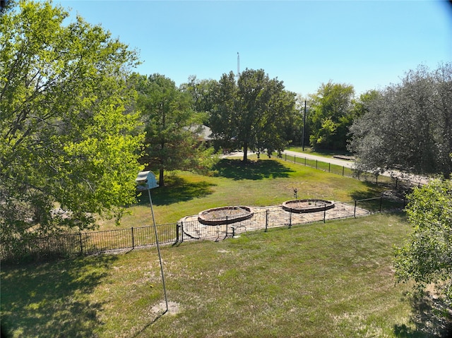 view of yard with a fire pit