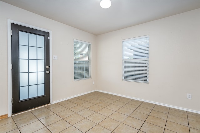 interior space featuring light tile patterned floors