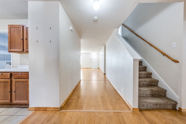 hallway featuring light wood-type flooring