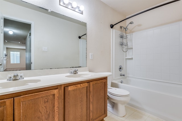 full bathroom featuring tile patterned floors, toilet, bathing tub / shower combination, and vanity