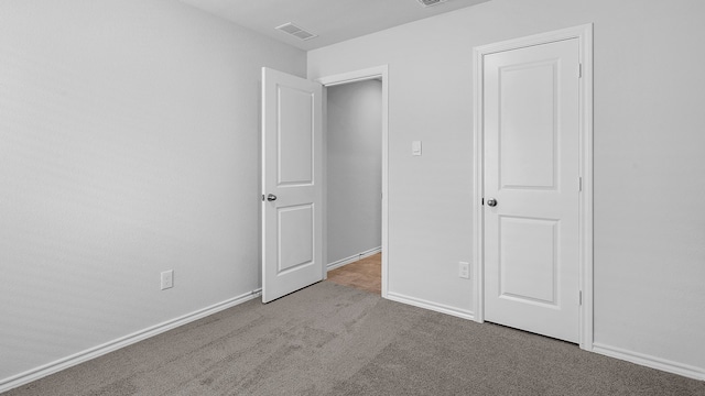 unfurnished bedroom featuring carpet floors