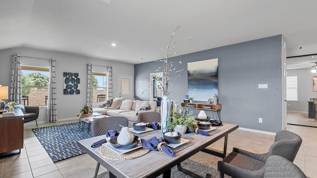 tiled living room featuring ceiling fan