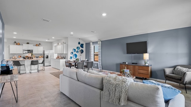 living room featuring vaulted ceiling