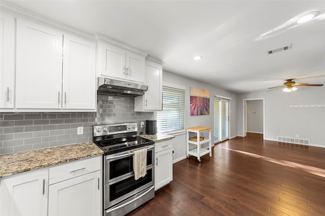 kitchen with dark hardwood / wood-style flooring, white cabinetry, double oven range, and ceiling fan