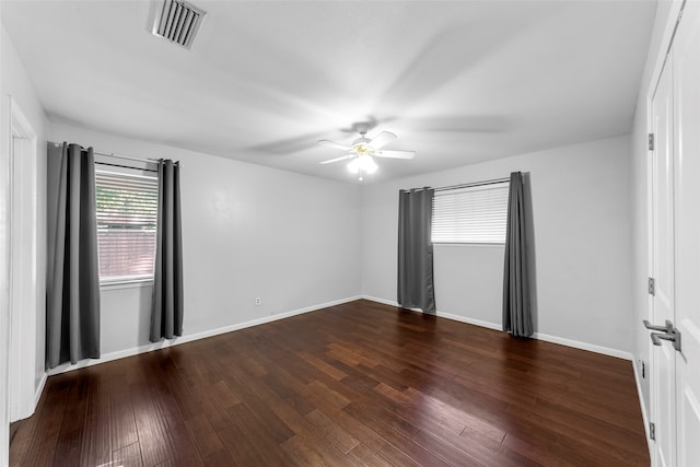 unfurnished room featuring hardwood / wood-style floors and ceiling fan