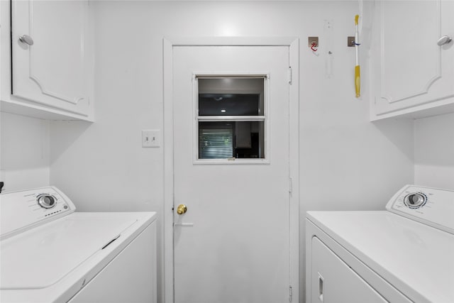 laundry area with cabinets and washer and dryer