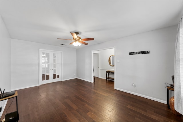 unfurnished living room featuring dark wood-type flooring, ceiling fan, and french doors