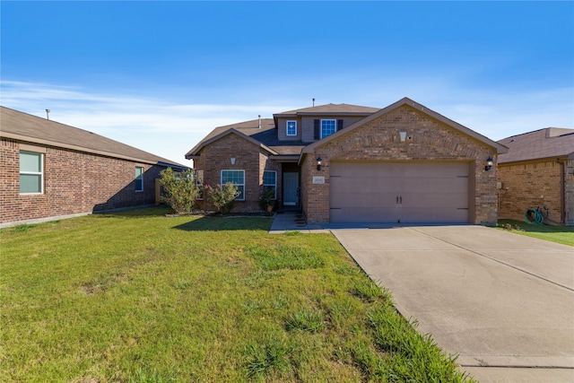 view of front of home with a front lawn and a garage