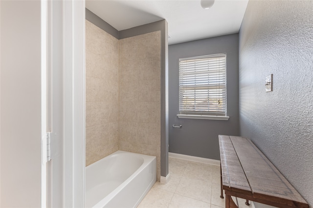 bathroom with tile patterned floors