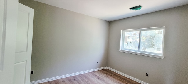 empty room with light wood-type flooring