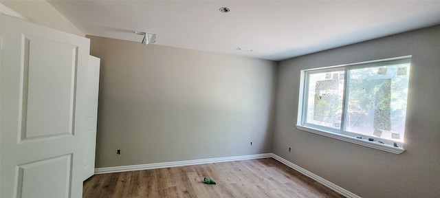 empty room featuring light hardwood / wood-style floors