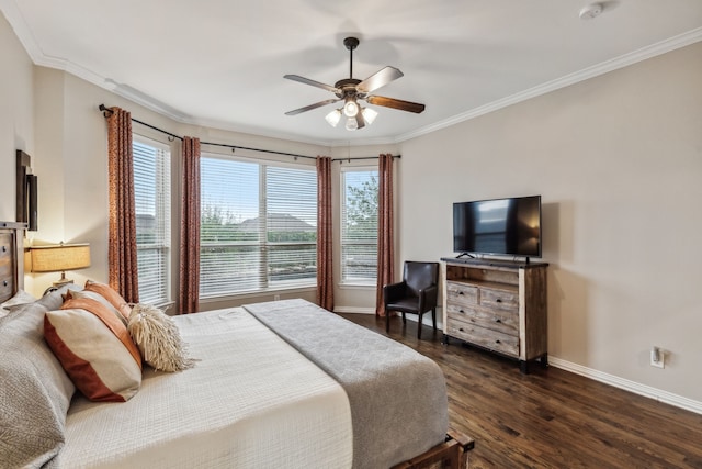 bedroom with multiple windows, dark hardwood / wood-style flooring, ceiling fan, and crown molding