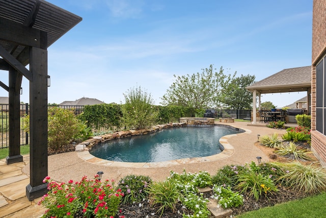 view of swimming pool featuring a patio