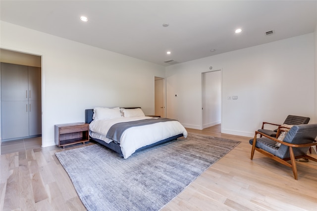 bedroom featuring light hardwood / wood-style flooring