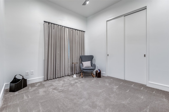 unfurnished room with light colored carpet