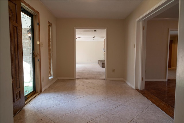 interior space with light tile patterned floors