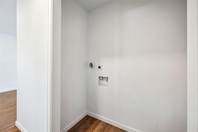 washroom with electric dryer hookup, hookup for a washing machine, and hardwood / wood-style flooring