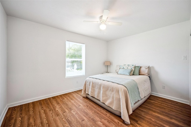 bedroom featuring hardwood / wood-style flooring and ceiling fan