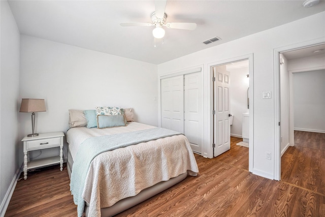 bedroom with ceiling fan, a closet, and hardwood / wood-style flooring