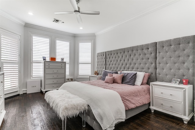 bedroom featuring crown molding, ceiling fan, and dark hardwood / wood-style flooring