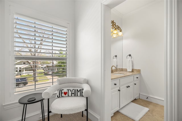 bathroom with vanity, ornamental molding, and tile patterned floors