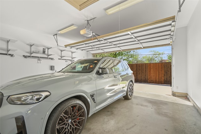 garage featuring a garage door opener