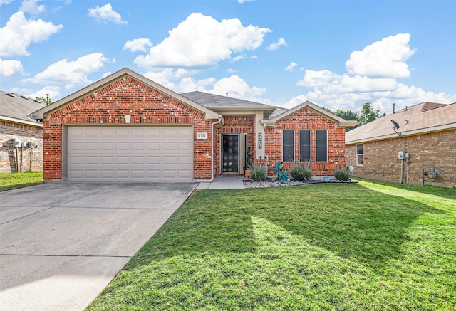 view of front of home featuring a garage and a front lawn