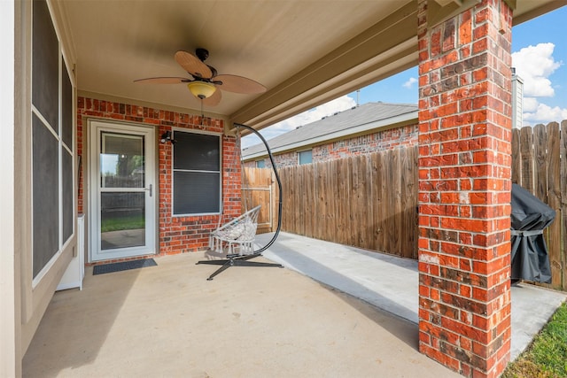 view of patio / terrace featuring ceiling fan