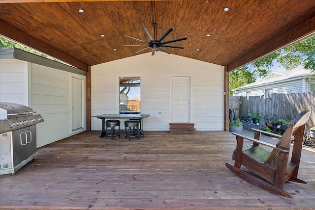 wooden deck featuring a grill and ceiling fan