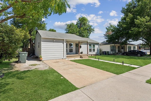 ranch-style house featuring a front lawn