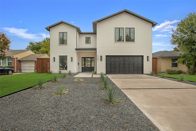 view of front of home with a garage