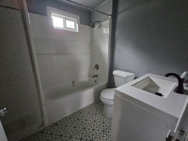 full bathroom with shower / washtub combination, vanity, and toilet